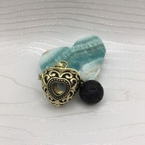 Heart Aromatherapy Brass tone Locket.  Lava stone included.